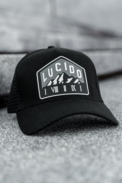 WHITE AND GREY MOUNTAIN TRUCKER